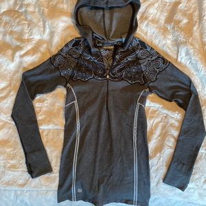 Athleta hoodie in gray and black. Beautiful lace look design. In great condition